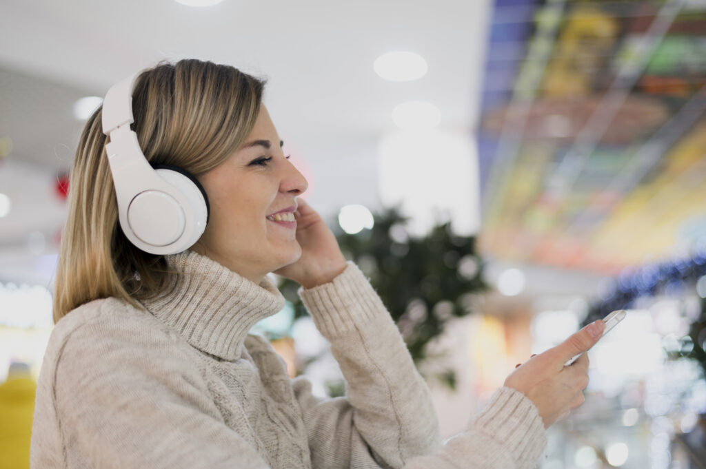 woman-wearing-headphones-shopping-mall